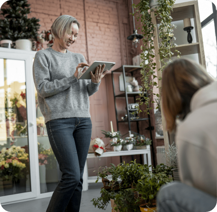 537~medium-shot-women-working-flower-shop.png